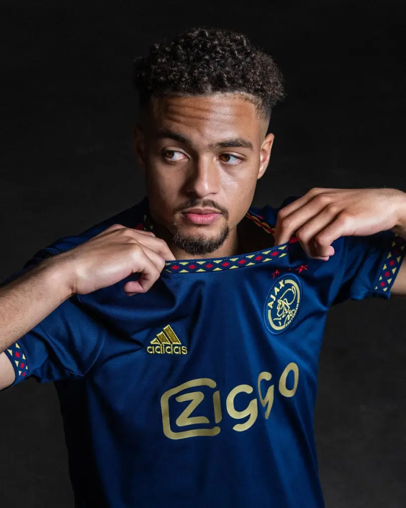 The New Champions' Attire: An In-depth Look at Ajax's 2022-23 Away Kit in Collaboration with Adidas